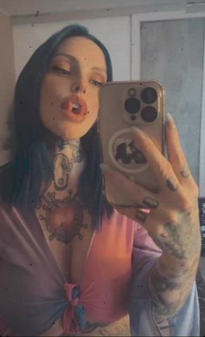 Showing off her Split tongue