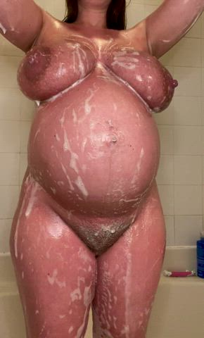 i love watching the soap drip over my huge preggo nipples