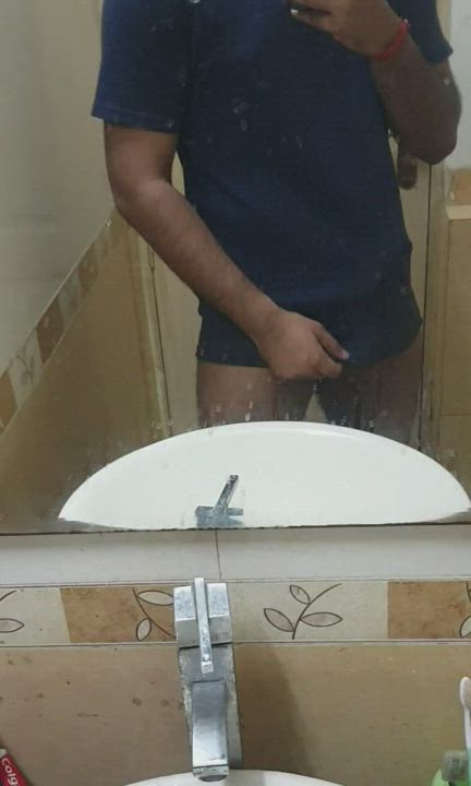 Suck my balls while I slap your face with my cock