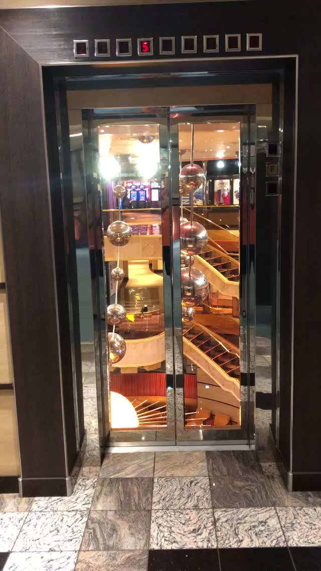 Riding and exiting elevator while naked