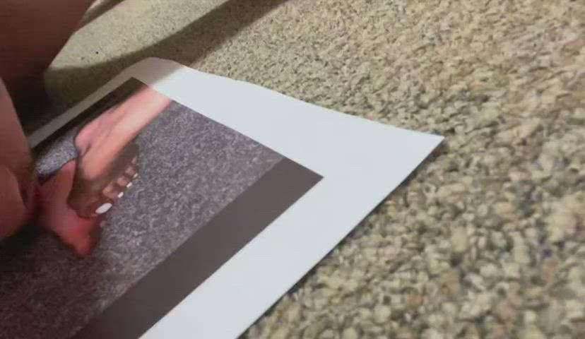 look at my good slave he was allowed to lick photos of my feet he printed out for