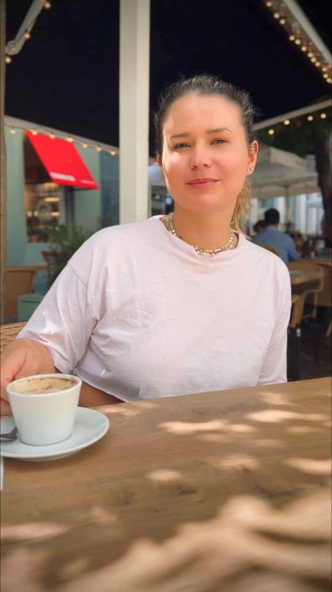 Underboob tops are perfect when drinking coffee in a busy square.
