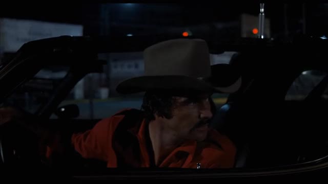 Smokey-and-the-Bandit-1977-GIF-00-14-45-bandit-mugs-to-camera