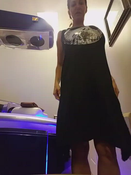 Ava stripping, getting ready to tan
